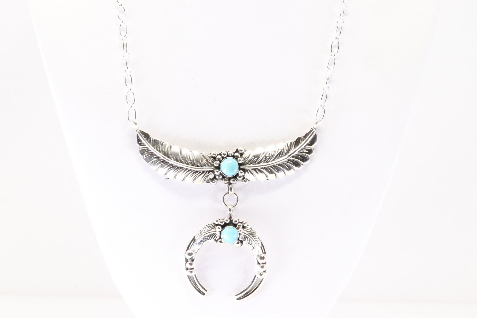 Native America Navajo Sterling Silver Turquoise Feather Necklace By Loretta Delgarito.: This is a Native America Navajo Sterling Silver Turquoise Feather Necklace By Loretta Delgarito. Stamp By R.B Company. Necklace Length: 16.00.