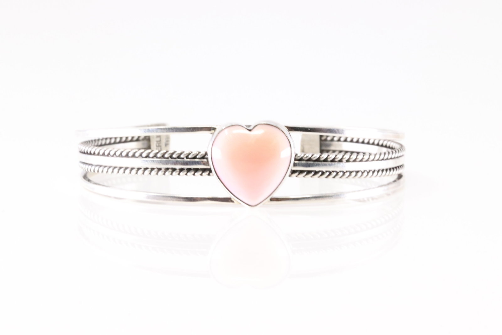 Native America Navajo Sterling Silver Pink Conch Heart Bracelet Cuff By Roy Tom.: This is a Native America Navajo Sterling Silver Pink Conch Heart Bracelet Cuff By Roy Tom. Stamp R. Tom.