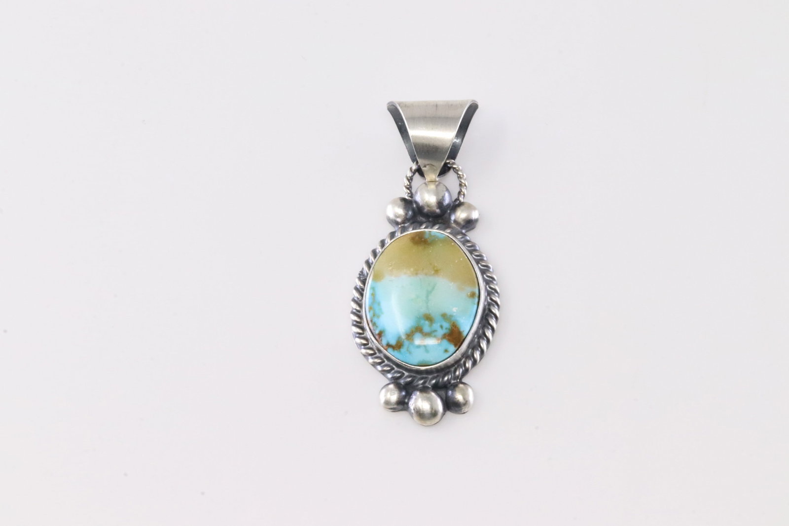 Native America Navajo Sterling Silver Sonora Gold Turquoise Pendant By MB.: This is a Native America Navajo Sterling Silver Sonora Gold Turquoise Pendant By MB. Stamp MB.
