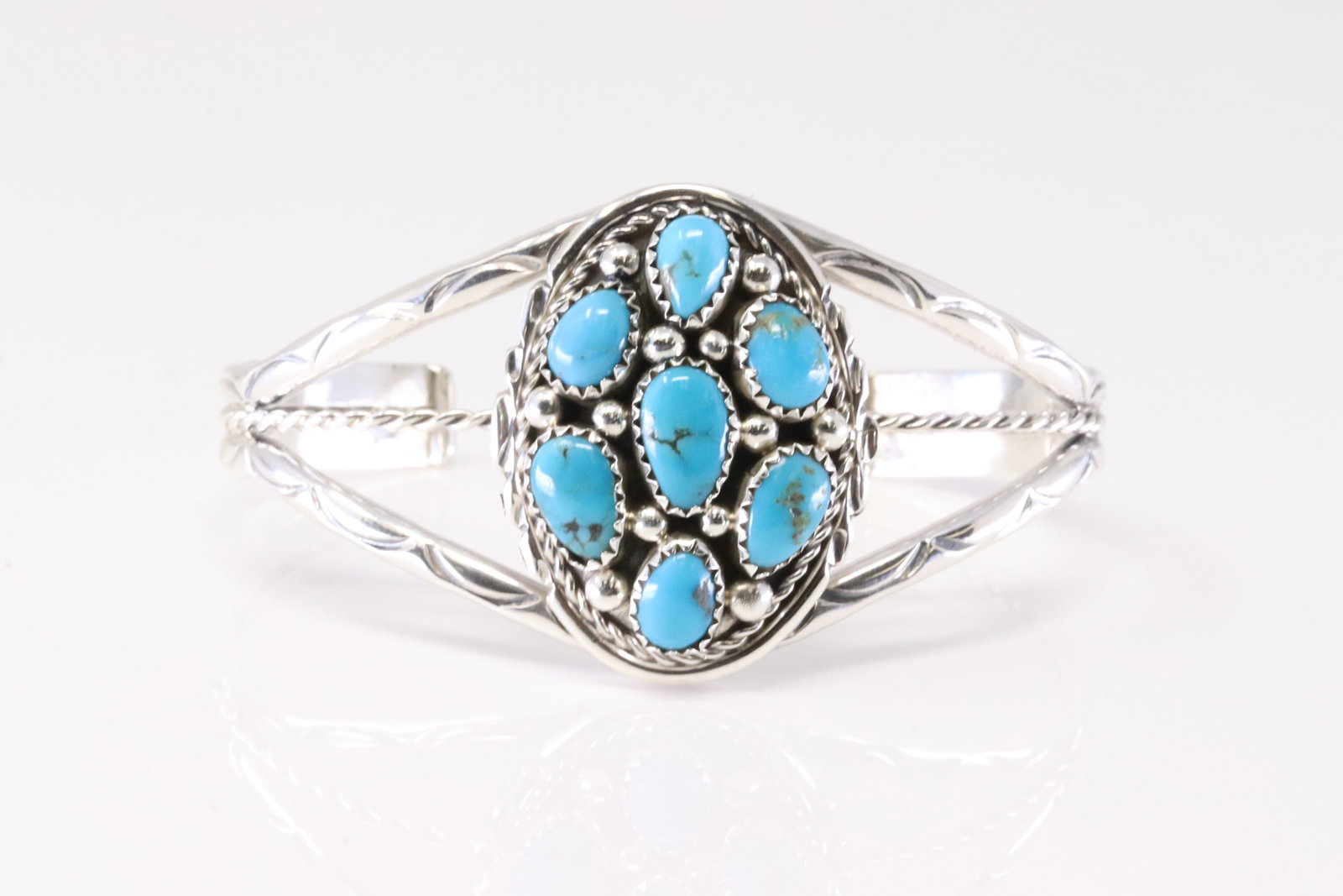 Native America Navajo Sterling Silver Turquoise Bracelet Cuff By Melvin Chee.: This is a Native America Navajo Sterling Silver Turquoise Bracelet Cuff By Melvin Chee. Stamp M Chee.