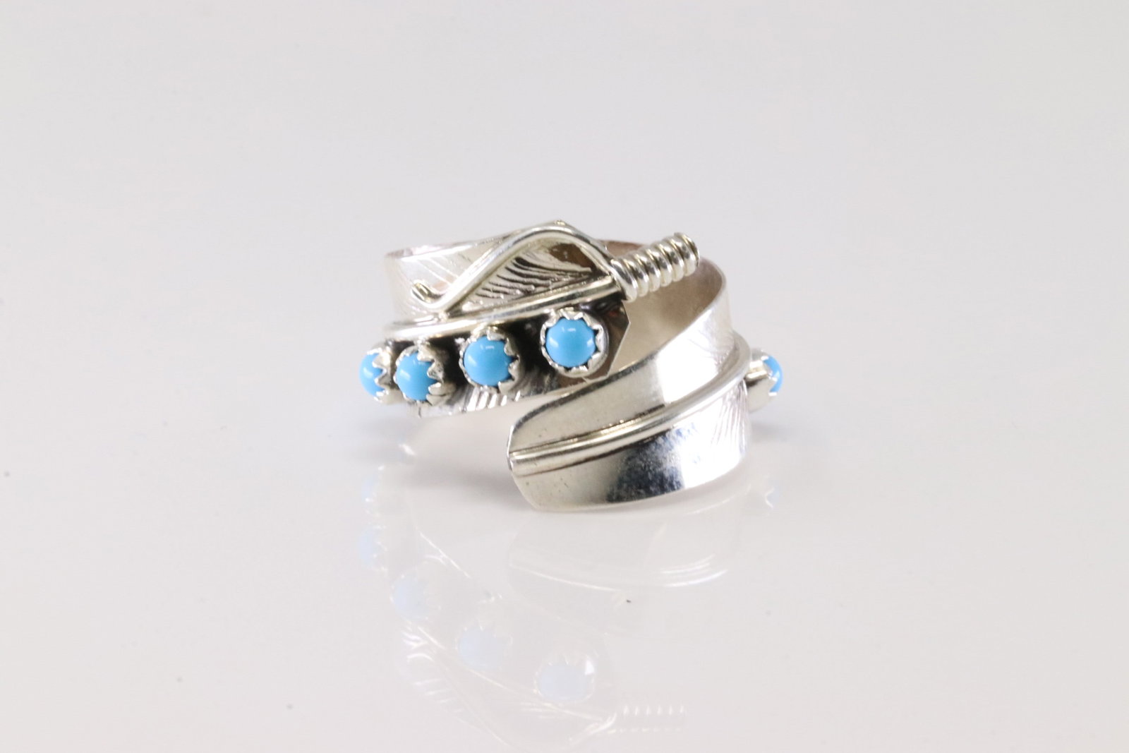 Native America Navajo Sterling Silver Turquoise Feather Ring.: This is a Native America Navajo Sterling Silver Turquoise Feather Ring. Ring Size: 8.25.