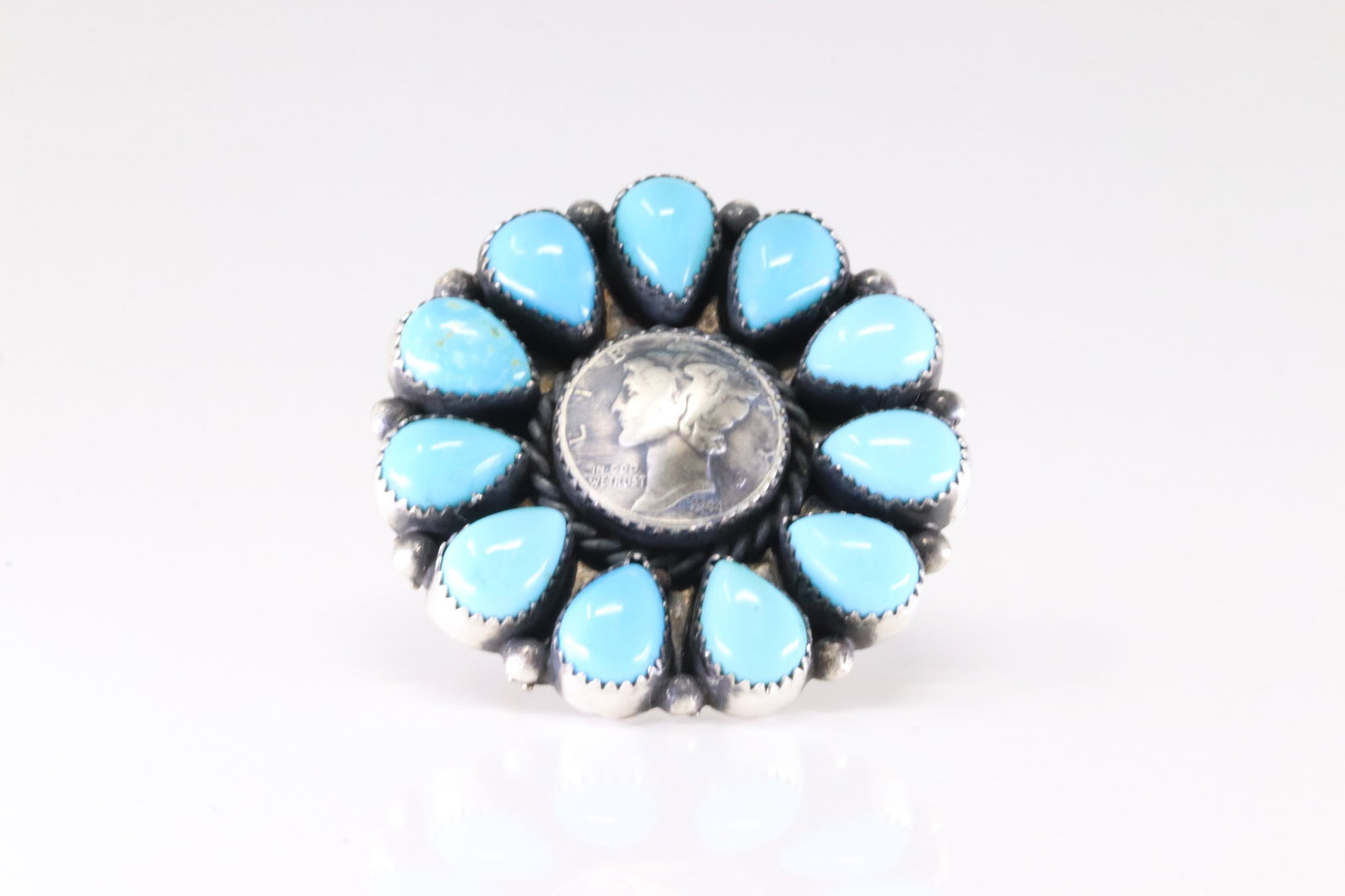 Native America Navajo Sterling Silver Turquoise Liberty Dime Ring By MJ.: This is a Native America Navajo Sterling Silver Turquoise Liberty Dime Ring By MJ. Stamp MJ. Ring Size: 7.50.