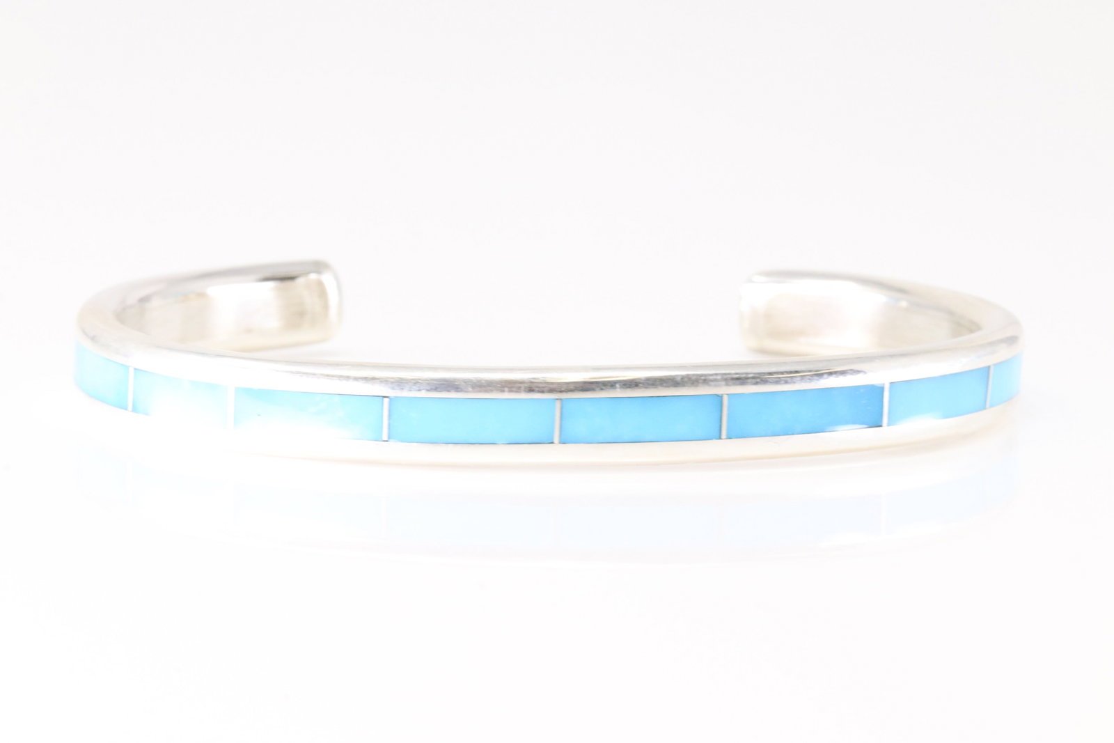 Native America Zuni Sterling Silver Turquoise Inlay Bracelet Cuff By Loretto.: This is a Native America Zuni Sterling Silver Turquoise Inlay Bracelet Cuff By Loretto. Stamp Loretto.