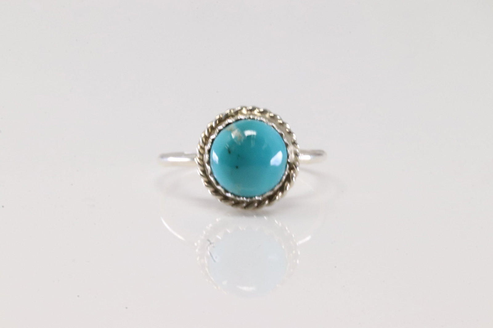 Native America Navajo Sterling Silver Turquoise Ring By Esther White.: This is a Native America Navajo Sterling Silver Turquoise Ring By Esther White. Stamp EW. Ring Size: 6.00.