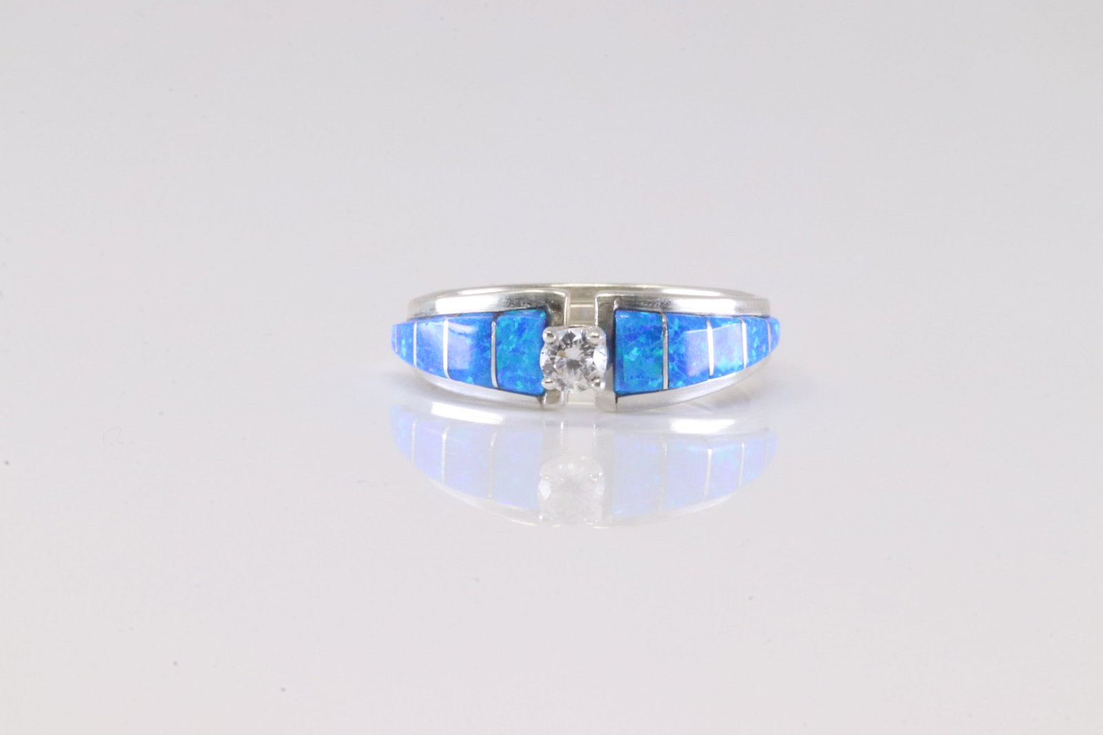 Native America Zuni Sterling Silver Synthetic Blue Opal Inlay & Sirconia Ring Band By MJS.: This is a Native America Zuni Sterling Silver Synthetic Blue Opal Inlay & Sirconia Ring Band By MJS. Stamp MJS. Ring Size: 9.75.