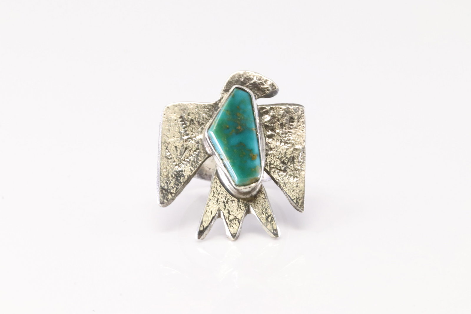 Native America Zuni Sterling Silver Turquoise Thunderbird Ring By Jude Candelaria.: This is a Native America Zuni Sterling Silver Turquoise Thunderbird Ring By Jude Candelaria. Ring size: 5.25.