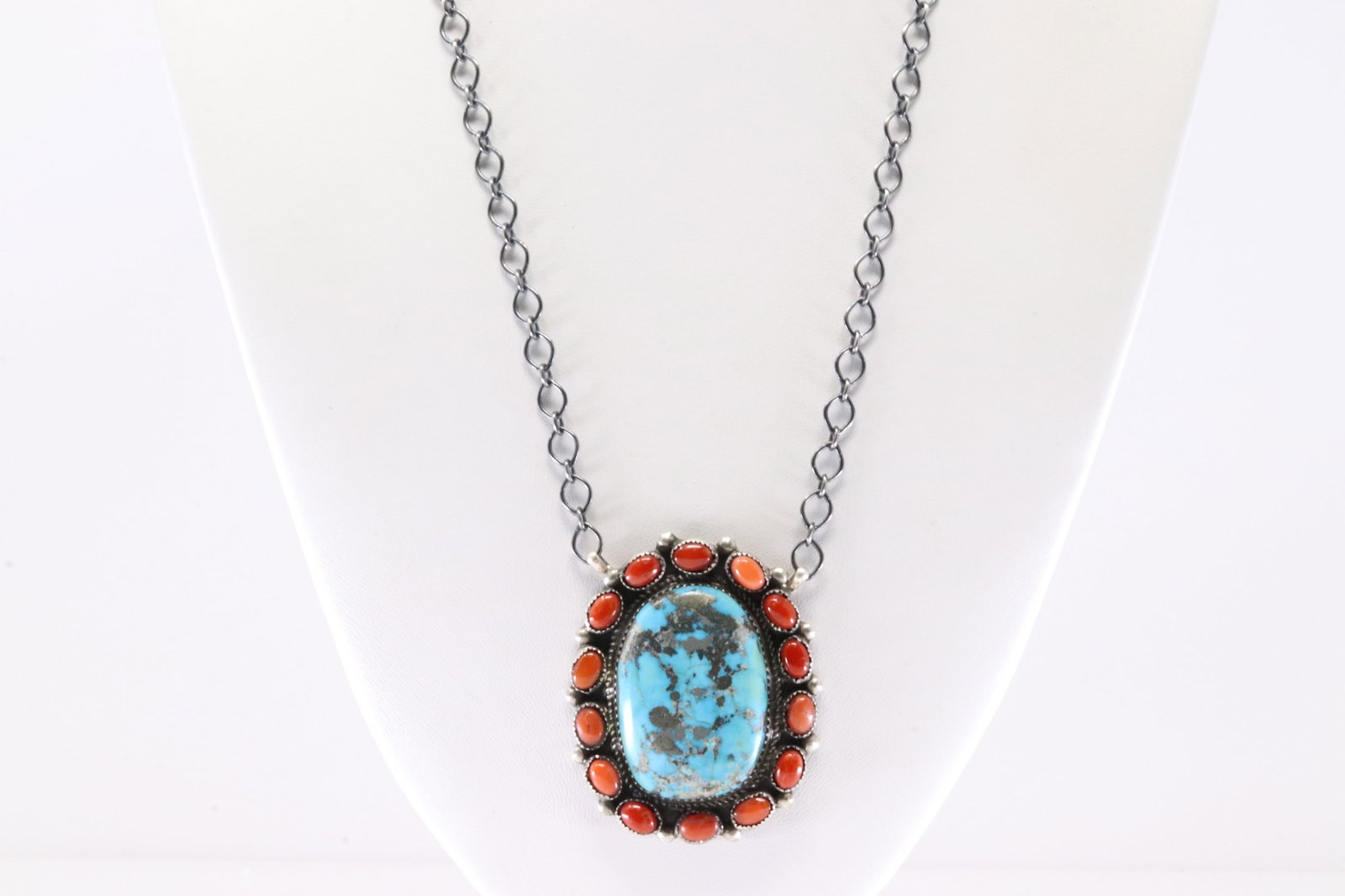 Native America Navajo Sterling Silver Coral & Turquoise Necklace By Donovan Nez.: This is a Native America Navajo Sterling Silver Coral & Turquoise Necklace By Donovan Nez. Necklace length: 20.00"