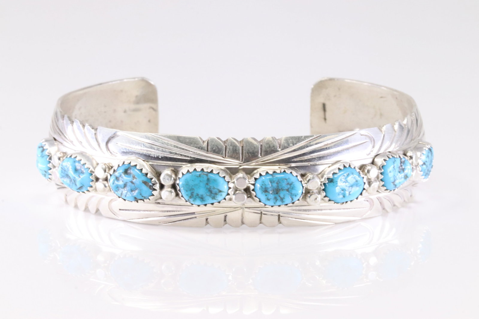 Native America Navajo Sterling Silver Turquoise Bracelet Cuff By S.: This is a Native America Navajo Sterling Silver Turquoise Bracelet Cuff By S. Stamp S.