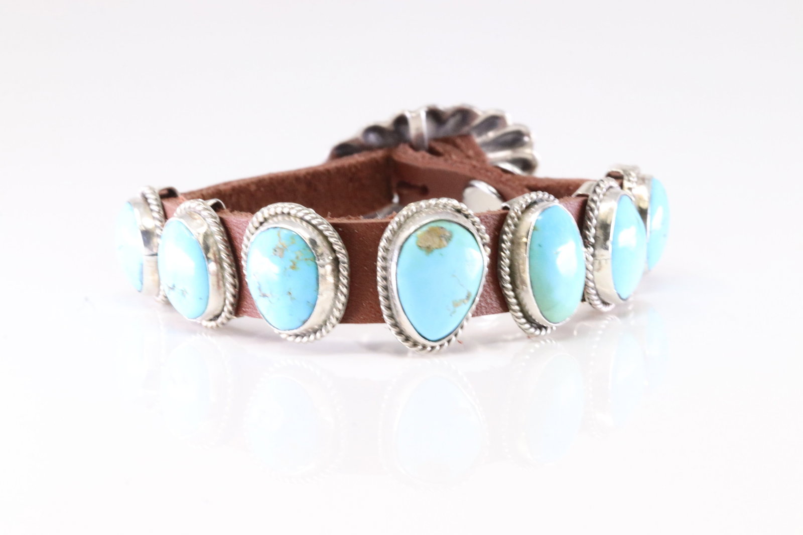 Native America Navajo Sterling Silver Turquoise Leather Concho Bracelet Link By BC.: This is a Native America Navajo Sterling Silver Turquoise Leather Concho Bracelet Link By BC. Stamp BC. Bracelet Length: 10.00.