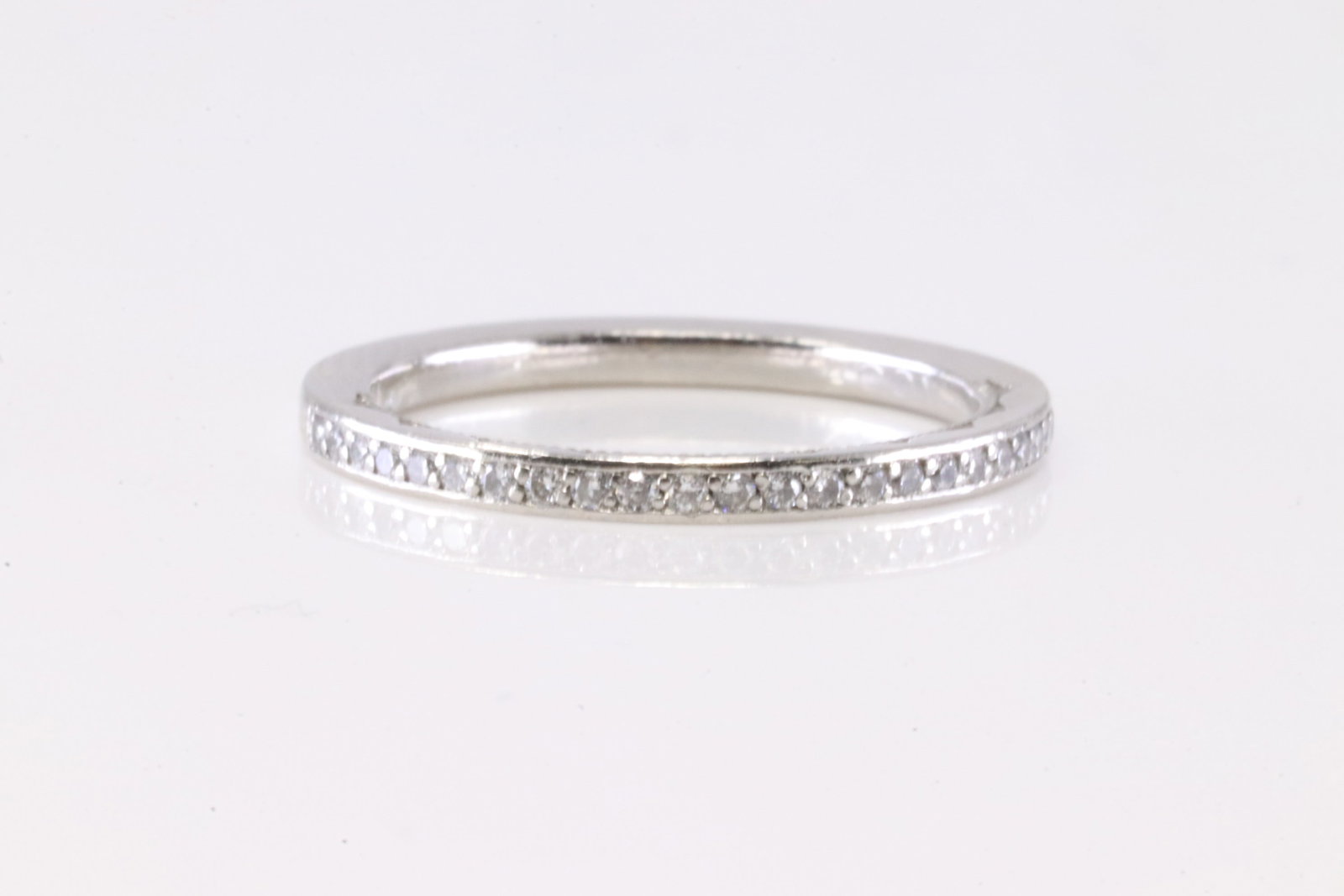 Tacori Platinum Diamond Ring.: Tacori Platinum Diamond Ring. This Charming Ring has 24 Round Sparkling Diamonds. Diamond Approx Weight: 0.25 CTW Ring Size: 5.75. Total Weight: 3.57 Grams.
