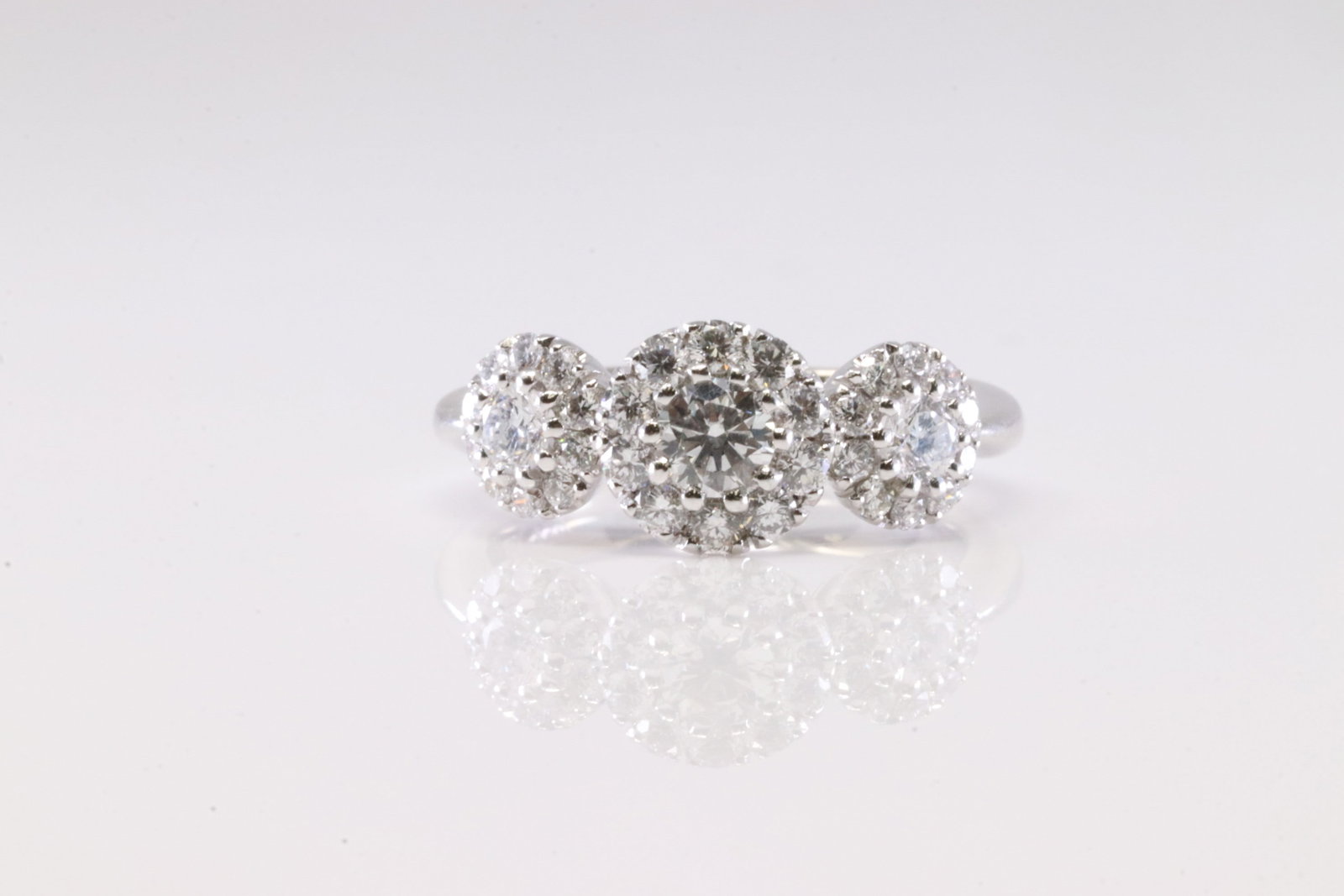 Elegant Diamond Ring 18Kt.: Ladies 18Kt White Gold Diamond Ring. This Elegant Ring has Flower Design with 33 Sparkling Diamonds. Diamonds weight approx: 1.14 ctw Ring size: 6.25. Total weight: 6.32 Grams.