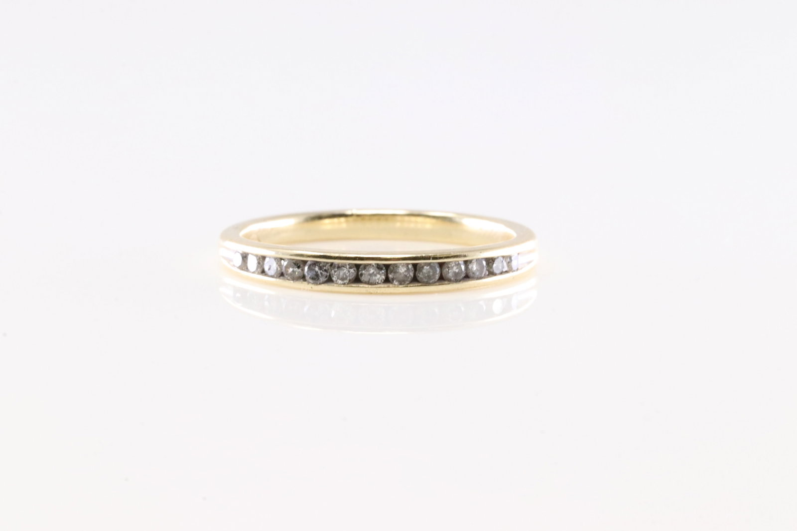 Diamond Ring 10Kt.: Ladies 10Kt Yellow Gold Diamond Ring. This Elegant Ring has 13 Round Sparkling Diamonds. Ring Size: 7.00.