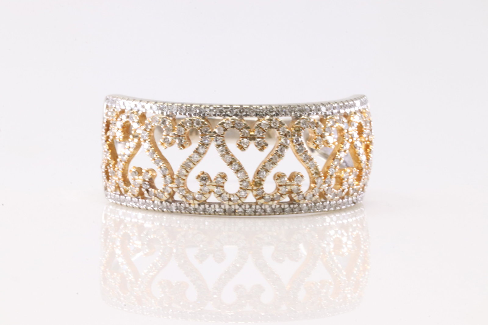 Diamond Ring 14Kt.: Ladies 14Kt White & Yellow Gold Diamond Ring. This Ring has Gorgeous Design With Sparkling Diamonds ( MOM Inside) . Diamond Approx Weight: 0.75ctw. Ring Size: 9.75. Total Weight: 3.36 Grams.