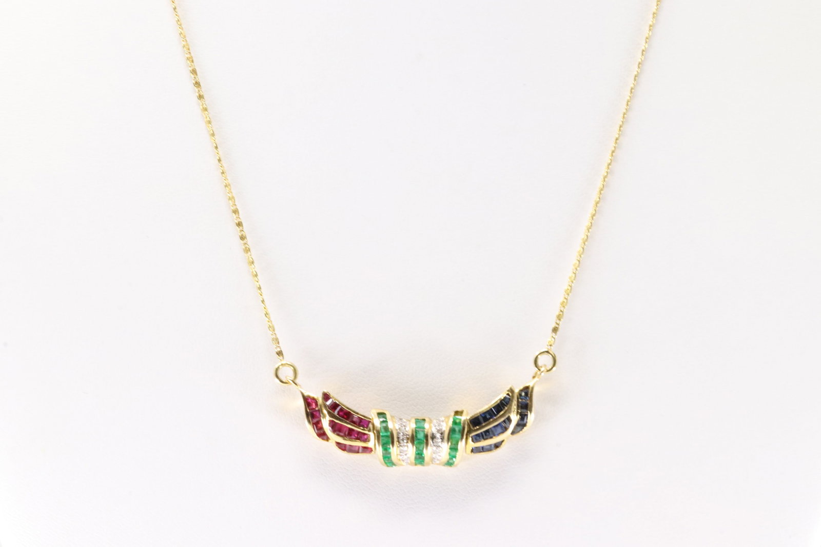 Multi-Color Gemstone & Diamond Necklace 18Kt.: Ladies 18Kt Yellow Gold Multi-Color Gemstone & Diamond Necklace. This Elegant Necklace has Charm with Rubies/ Emerald/ Sapphires & Sprakling Diamonds. 16.00" Total weight: 7.10 Grams.