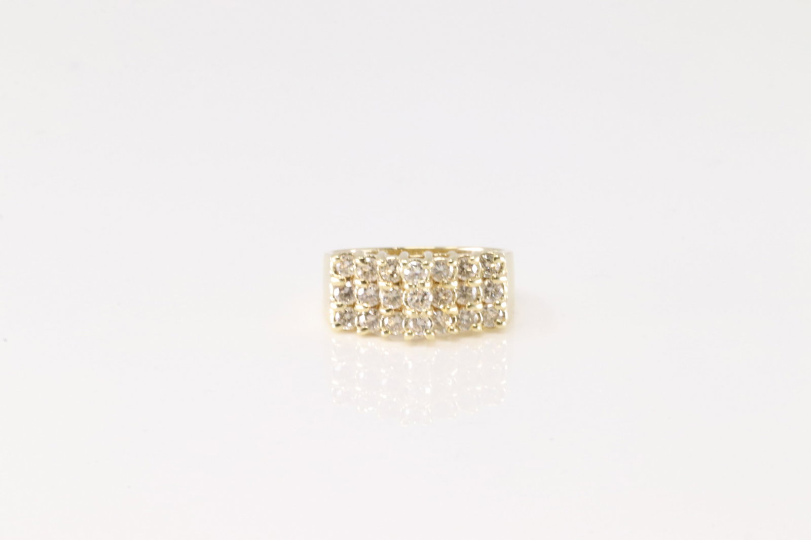 Diamond Ring 14Kt.: Ladies 14Kt Yellow Gold Diamond Ring. This Elegant Ring has 3 Row with 21 sparkling Diamonds. Diamonds weight approx: 0.50 ctw Ring size: 5.50. Total weight: 4.50 Grams.