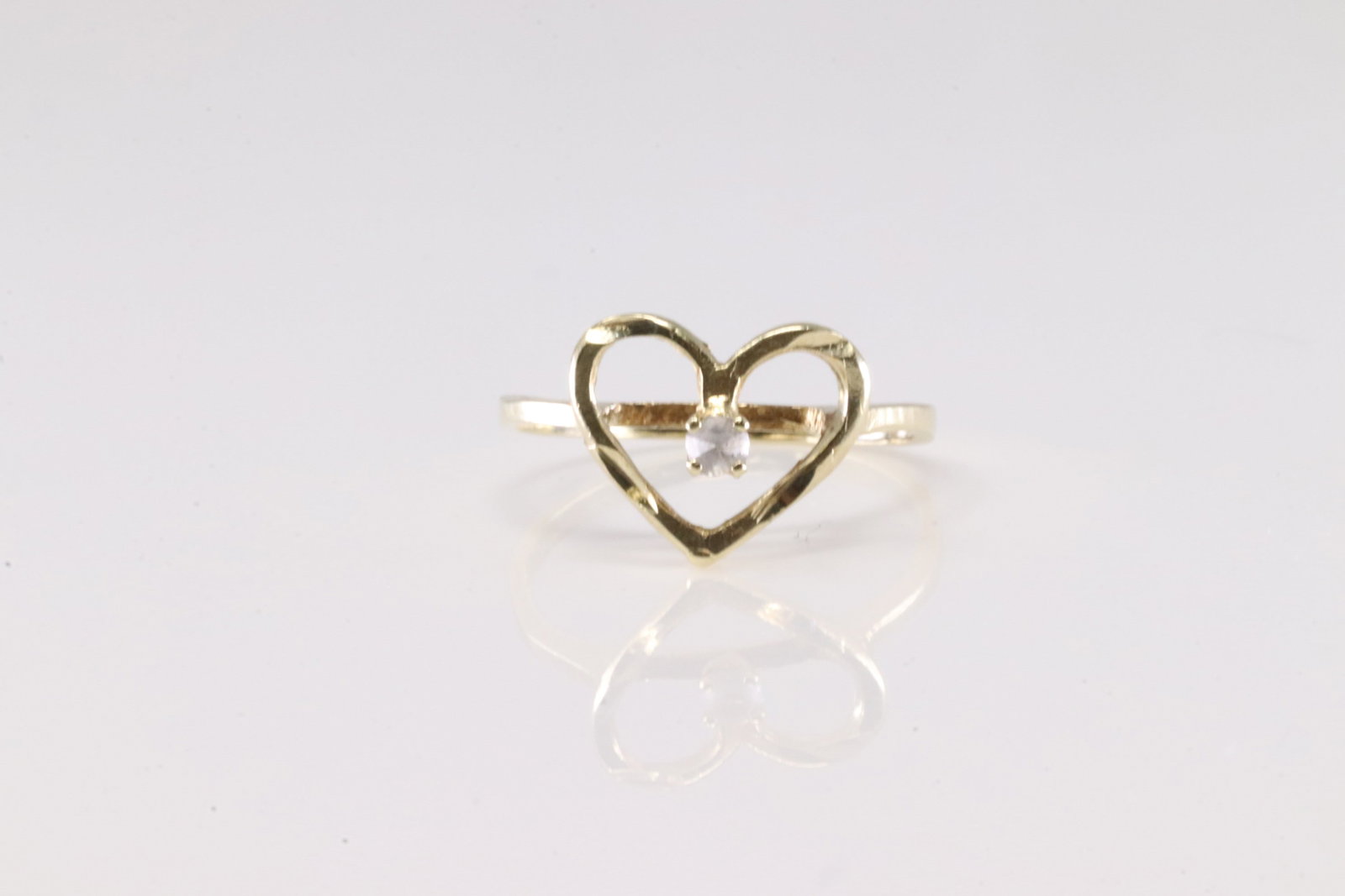 Diamond Heart Ring 14Kt.: Ladies 14Kt Yellow Gold Heart Diamond Ring. This Charming Heart Ring has Solitaire Diamond. Ring size: 5.00.