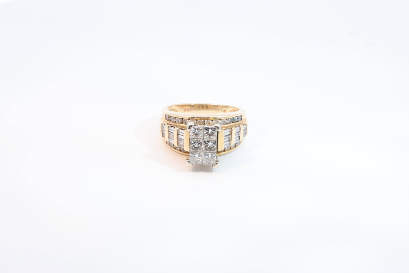 14Kt Yellow Gold Engagement Ring.: This Beautiful Engagement Ring Comes With Unique Details The Main center Stones arePrincess Cut Diamonds & Radiant Baguette Cut Diamonds On Each Sides & Sparkling Round Cut Diamond On Top & Bottom