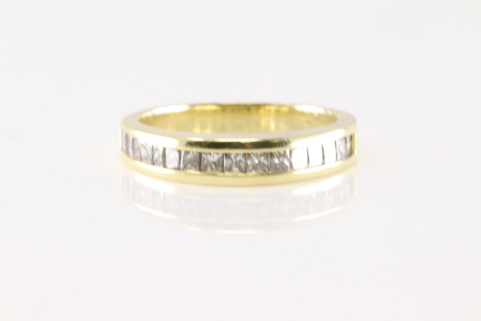 Diamond Ring 14Kt.: Ladies 14Kt Yellow Gold Diamond Ring. This Elegant Ring has 16 Brilliant Diamonds. Diamond Weight Approx: 0.59ctw. Ring Size: 5.50. Total Weight: 2.60 Grams.