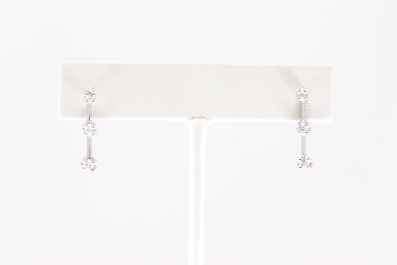 Diamond Stud Earring 14Kt.: Ladies 14Kt White Gold Diamond Stud Earring. This Gorgreous Earring has 3 Round Diamond Drop.