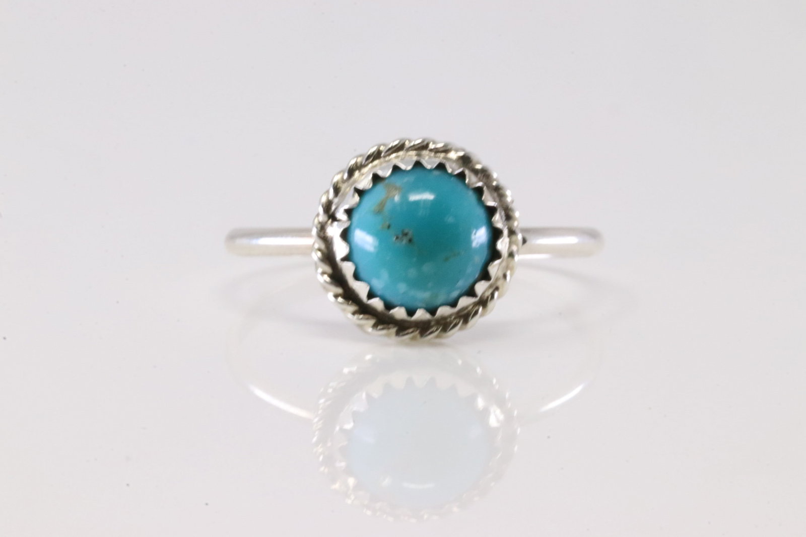 Native America Navajo Sterling Silver Turquoise Ring By EW.: This is a Native America Navajo Sterling Silver Turquoise Ring By EW. Stamp EW. Ring Size: 8.75.