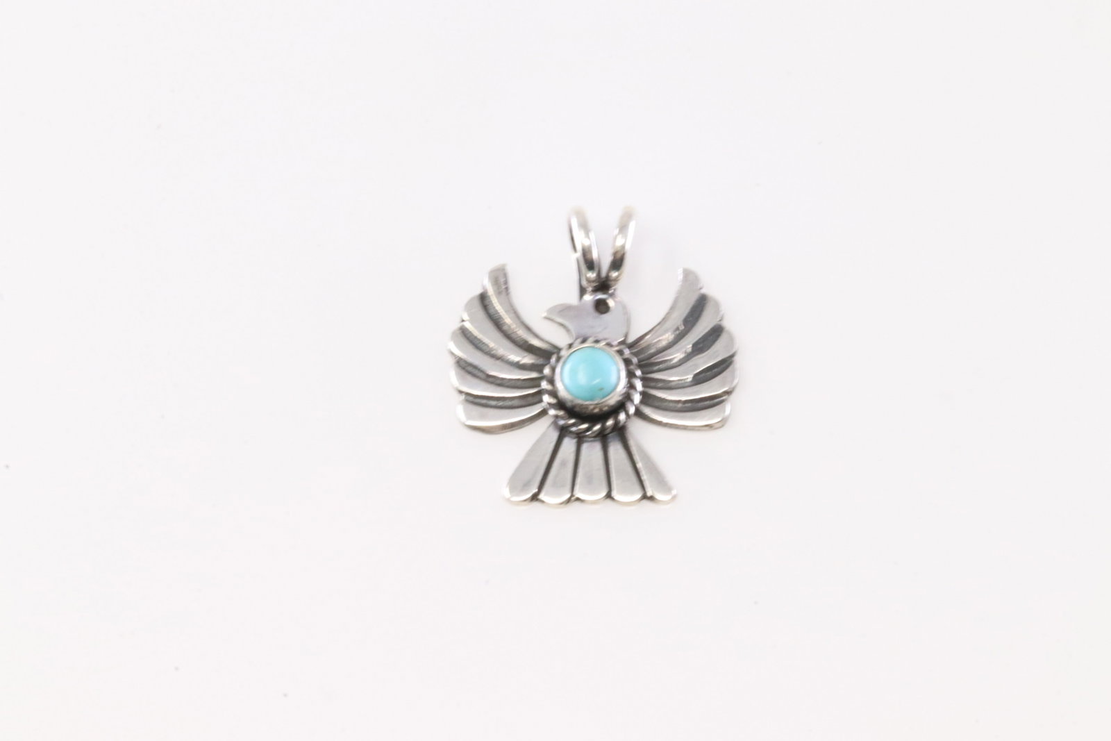 Native America Navajo Sterling Silver Turquoise Thunderbird Pendant By Dylane Reeves.: This is a Native America Navajo Sterling Silver Turquoise Thunderbird Pendant By Dylane Reeves.