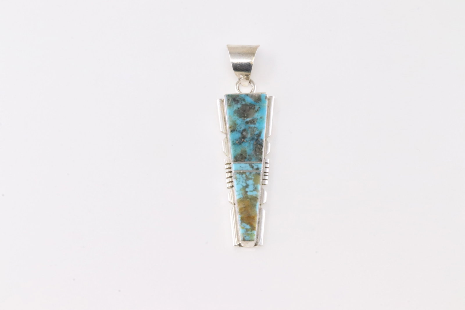 Native America Navajo Sterling Silver Turquoise Inlay Pendant By Brandon Etcitty.: This is a Native America Navajo Sterling Silver Turquoise Inlay Pendant By Brandon Etcitty.