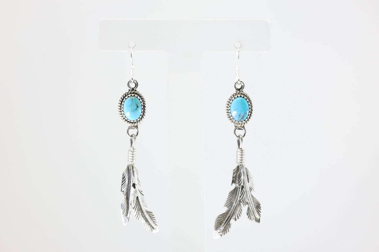 America Sterling Silver Turquoise Feather Dangling Earring's.: This is a America Sterling Silver Turquoise Feather Dangling Earring's.