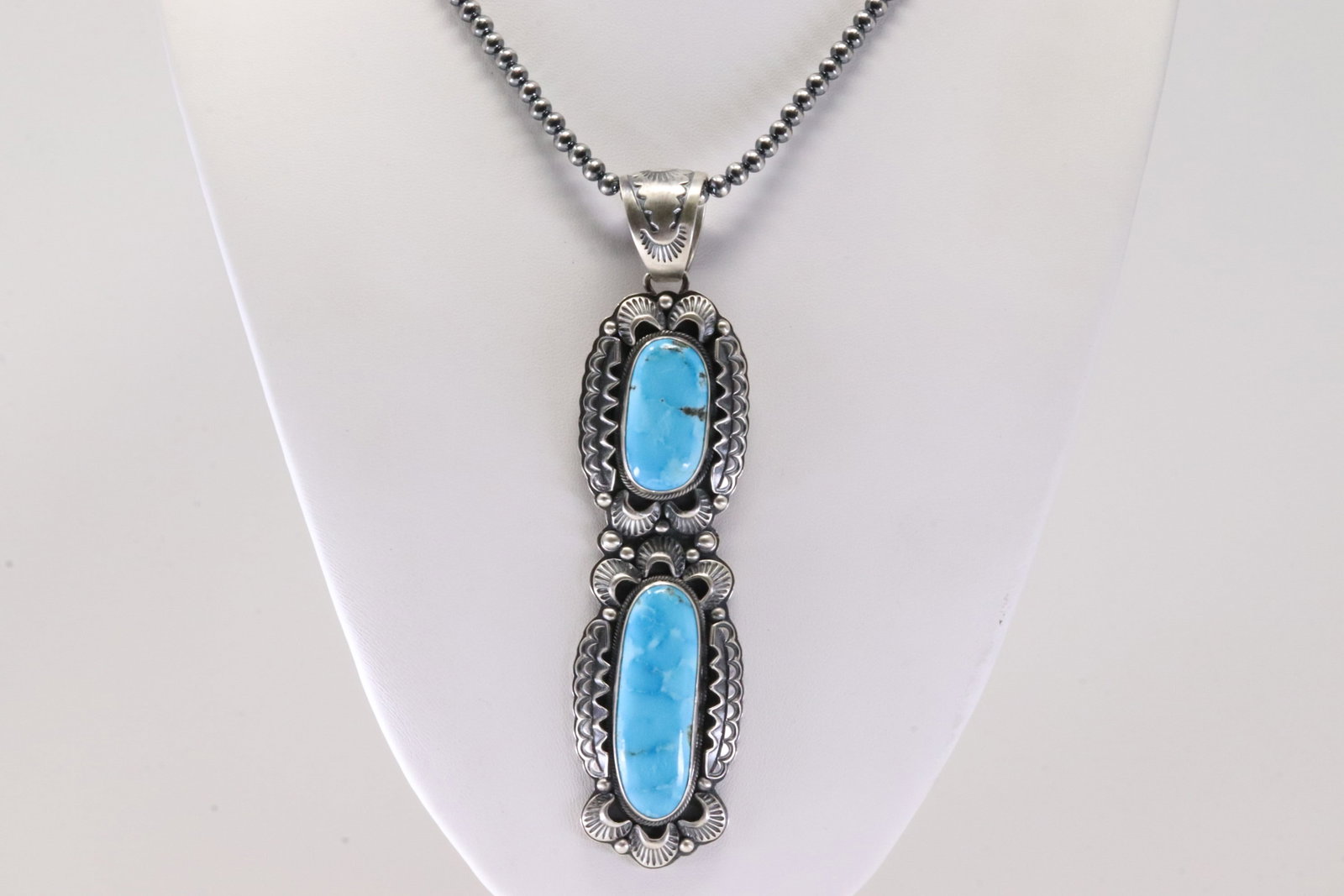 Native America Navajo Sterling Silver Turquoise Pendant By Randy Royd With Machine Made Sterling: This is a Native America Navajo Sterling Silver Turquoise Pendant By Randy Royd With Machine Made Sterling Silver Pearl Beaded Necklace. Stamp Randy Royd. Necklace Length: 18.00.