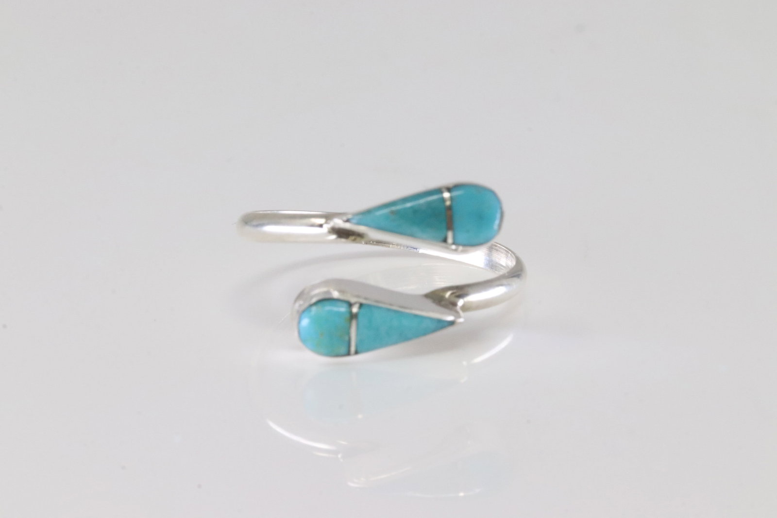 Native America Zuni Sterling Silver Turquoise Inlay Ring By R.V.N.: This is a Native America Zuni Sterling Silver Turquoise Inlay Ring By R.V.N. Ring size: 8.00.