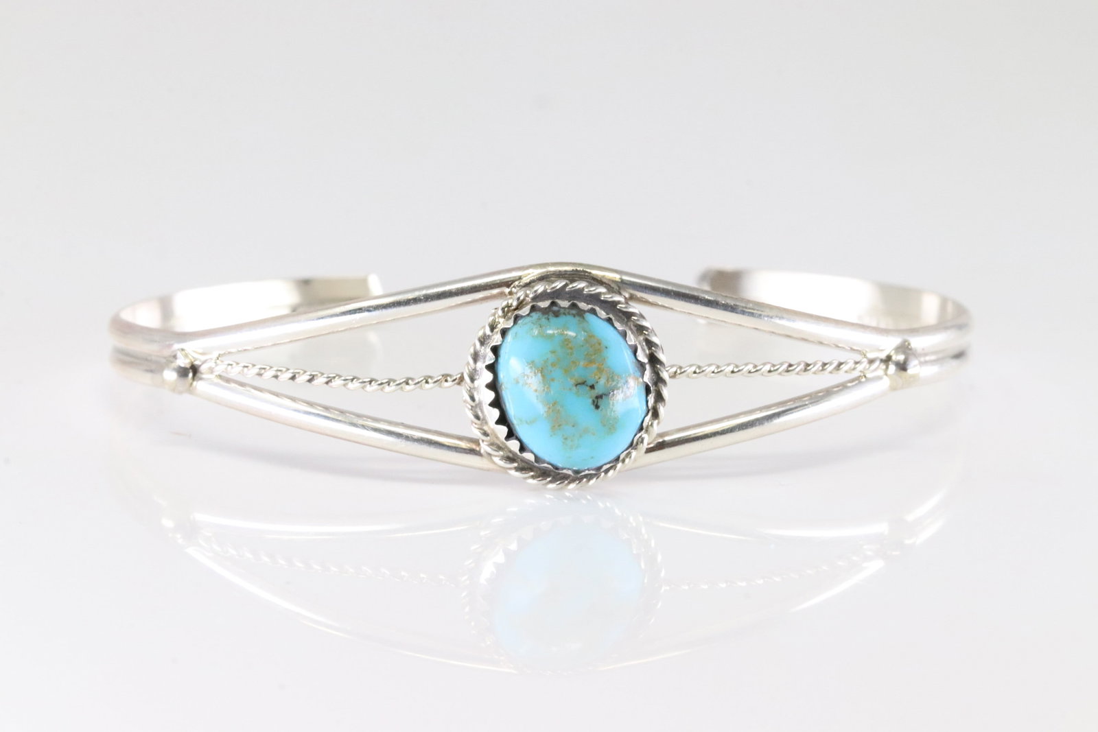 Native America Navajo Sterling Silver Turquoise Bracelet Cuff By E.W.: This is a Native America Navajo Sterling Silver Turquoise Bracelet Cuff By E.W.