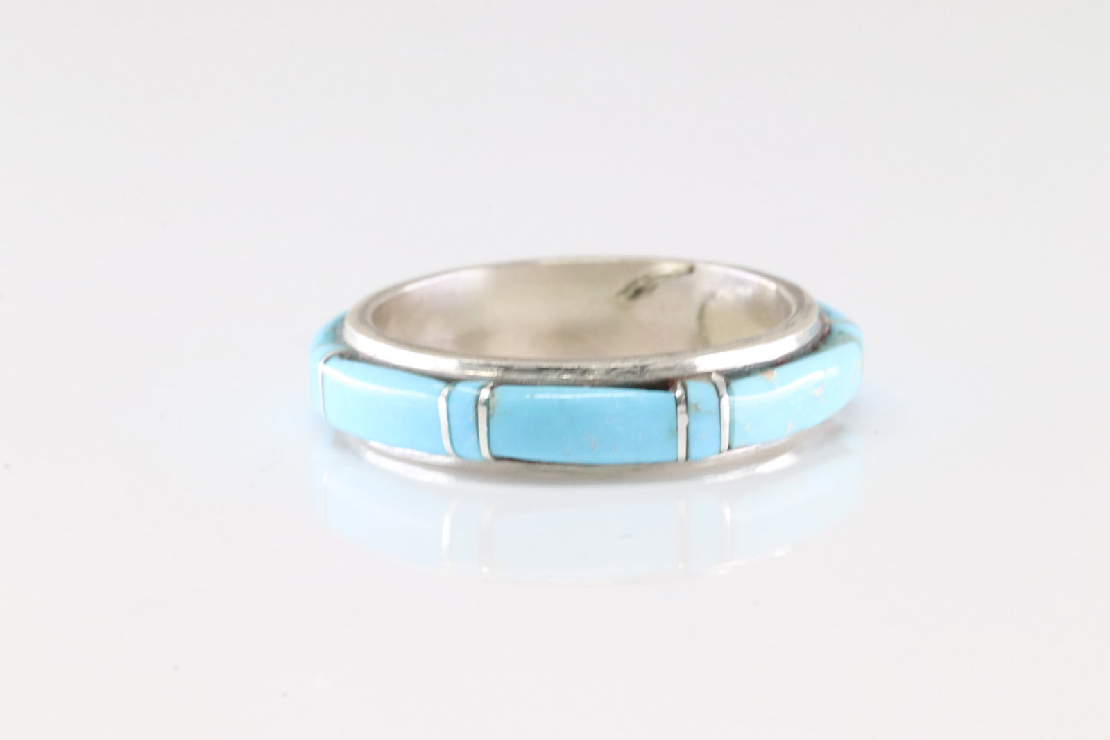 Native America Zuni Sterling Silver Turquoise Inlay Ring By Terrance Panteah.: This is a Native America Zuni Sterling Silver Turquoise Inlay Ring By Terrance Panteah. Ring size: 8.00.