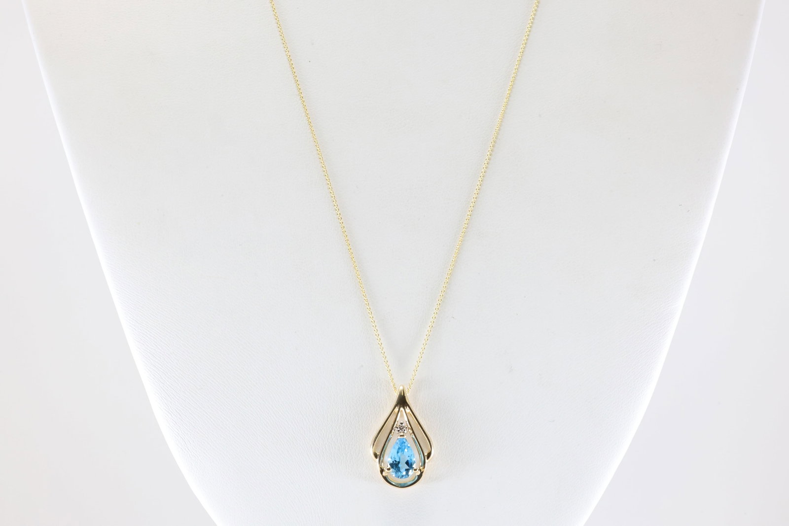 Blue Topaz & Diamond Pendant / Necklace 14Kt.: Ladies 14Kt Yellow Gold Blue Topaz & Diamond Pendant / Necklace. This Charming Pendant has Pear-Shape Blue Topaz with round Diamond & A 14K Necklace. Necklace length: 20.00" Total weight: 3.37 Grams.