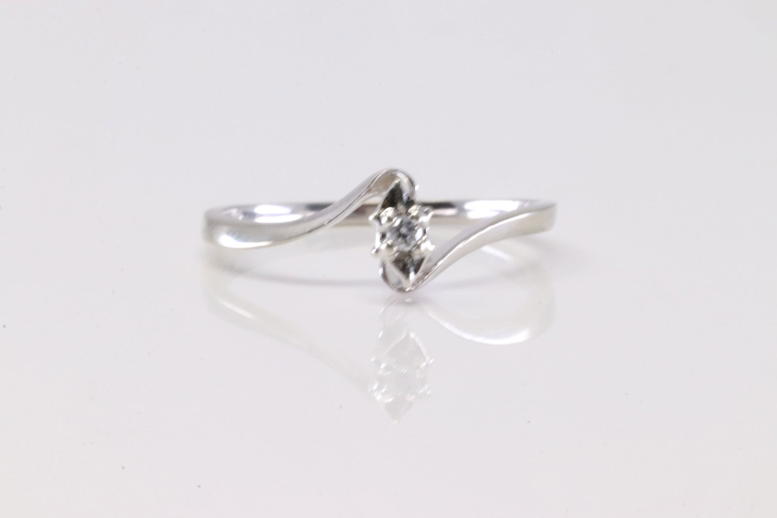 Diamond Ring 10Kt.: Ladies 10Kt White Gold Diamond Ring. This Charming Ring has Solitaire Diamond. Ring size: 7.75.