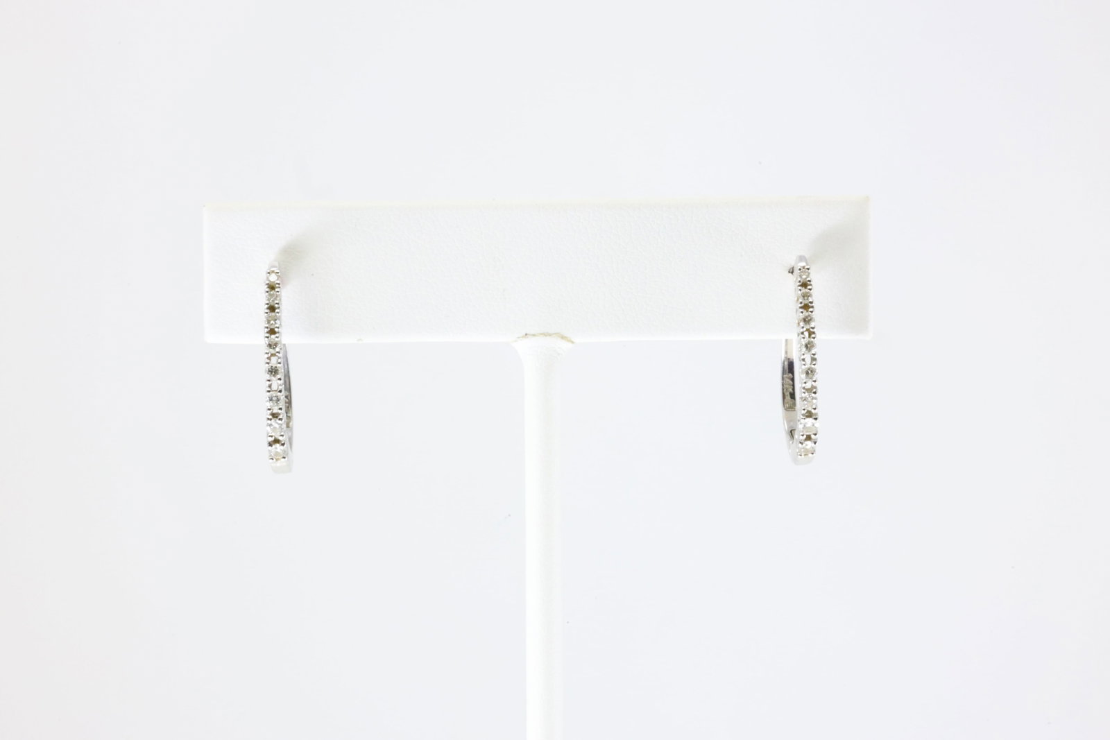 Diamond French Clip Earring 14Kt.: Ladies 14Kt White Gold Diamond French Clip Earring. This Elegant Earring has 16 Round Sparkling Diamonds. Diamond Weight Approx: 0.30 ctw. Total Weight: 2.50 Grams.