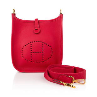 Hermes Evelyne TPM Bag, Rouge Casaque Clemence Leather,: Rouge Casaque Hermes Evelyne TPM bag in luscious Clemence leather which is soft and scratch resistant. Sport canvas body strap is crisp and clean with rare gold hardware. Perforated "H" logo on front