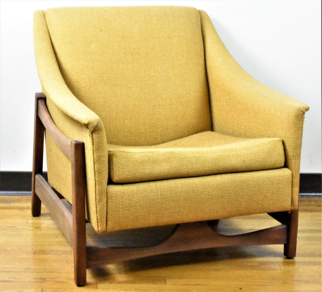 Mid Century Modern Deco House Living Room Chair: A mid century modern deco house living room chair / glider, constructed with a walnut frame. Needs to be reupholstered.