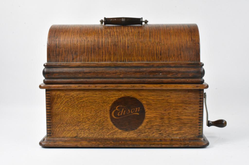 Antique Edison Cylindar Roll Phonograph: Antique Oak Edison Cylinder Roll player, finger join construction with round edison logo on front, measures approx. 16"W x 12"T x 9"D, untested, mechanical condition unknown, but appears to be in good