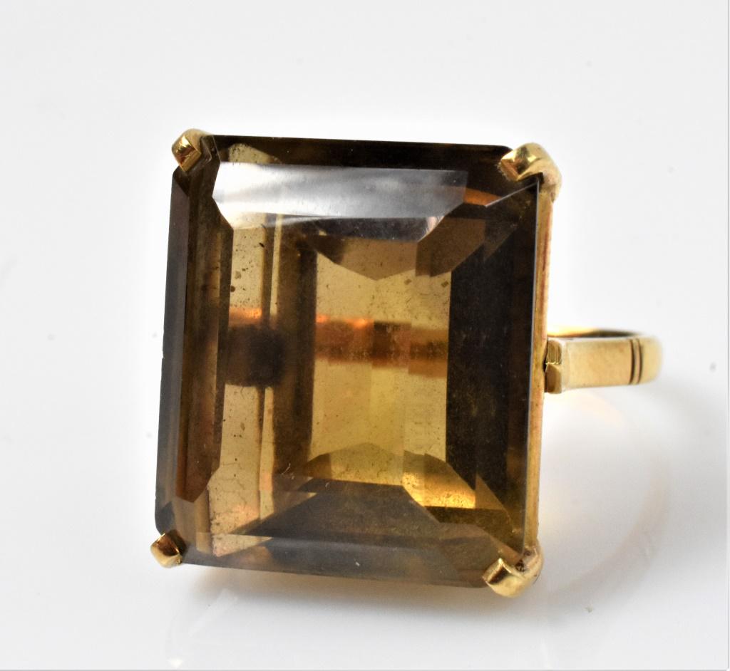 14K Gold Citrine Ring: 14k yellow gold Citrine ring set with a single large emerald cut citrine. Estate jewerly. Stone size is 18mm large x 16mm wide x 10.2mm diameter, approx. 17.25cts, 6.0dwt.Ring size 5 1/4