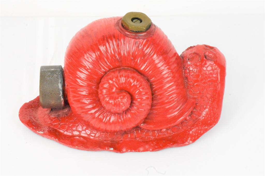 Antique Garden Snail Sprinkler Head: Older Garden Snail Sprinkler Head in Chalk or Composite. Missing Eye Stalks. Appears to have newer Paint. Measures approx. 7.5"l x 3.5"h.