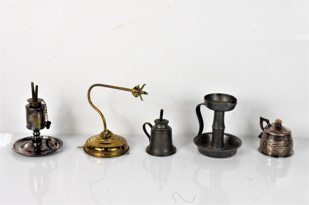 Antique Night Light Pewter & Silver Lamp Grouping: Grouping of (5) Night Light Oil Lamps. Includes Silver Lamp marked "Apollo EPNS made in USA by Bernard Rice 's Sons INc 4691 BeauXardt Reg U.S. Pat off" (1)Early Silver Nite Light Double Wick with Wic