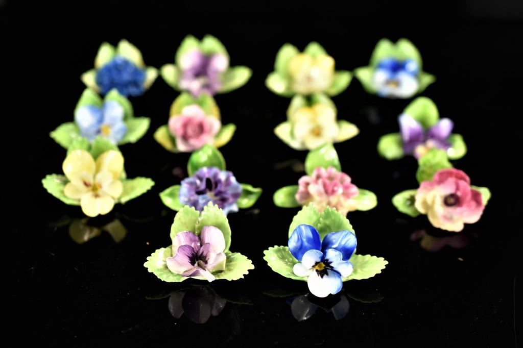 Royal Adderley Staffordshire Place Holder Grouping: Grouping of (14) Flower-Form Place-Card Holders. Includes (10) marked "Royal Adderley Floral Bone China Made in England" measuring approx. 1" w at base . Holders are Glossy with Bright Colors, and no 