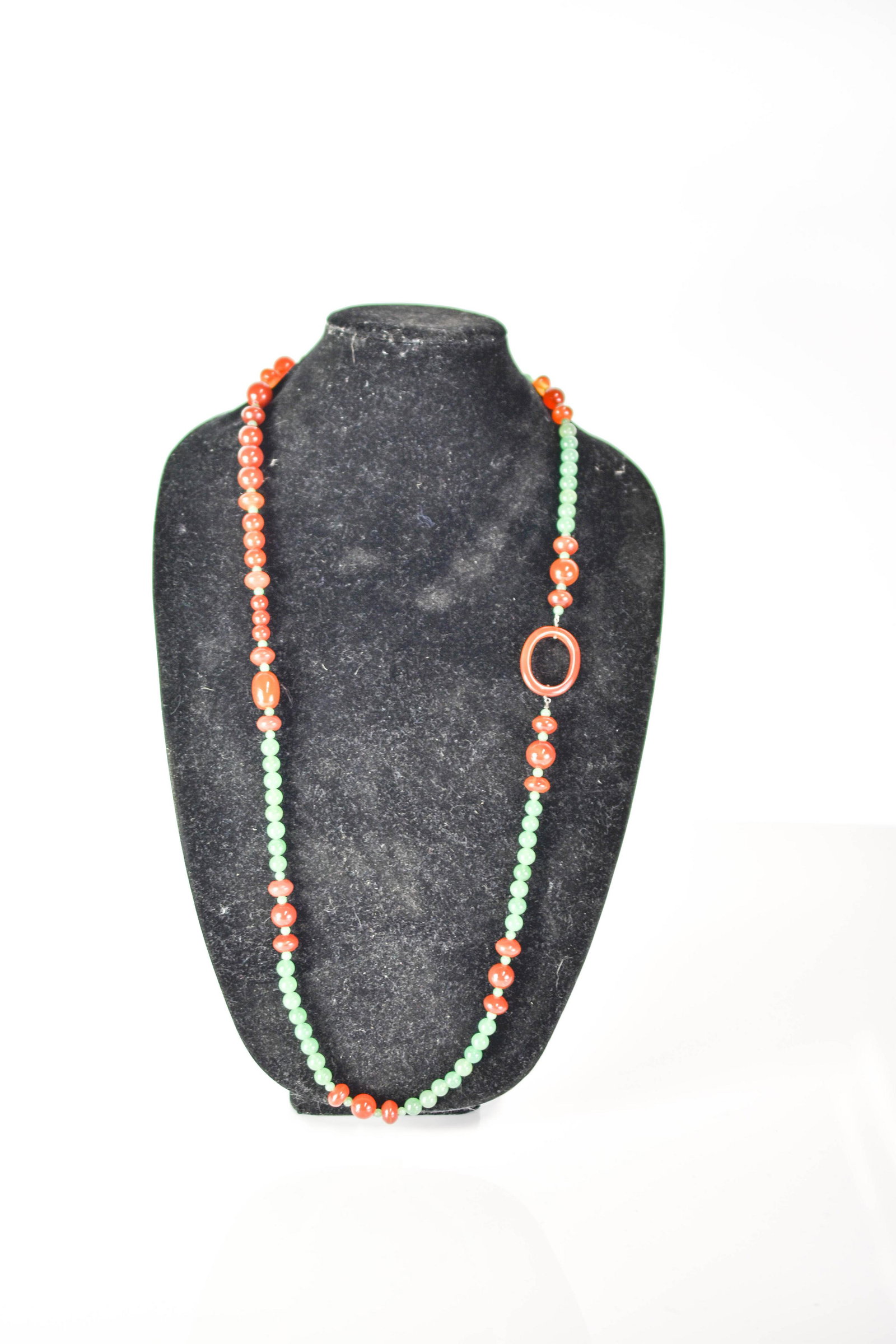 Jade Necklace: Includes a jade and jadeite necklace measuring approx. 40"l unclased.