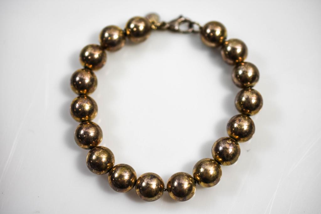 Tiffany & Co. Sterling Bracelet: Includes a Tiffany & Co. sterling bracelet.