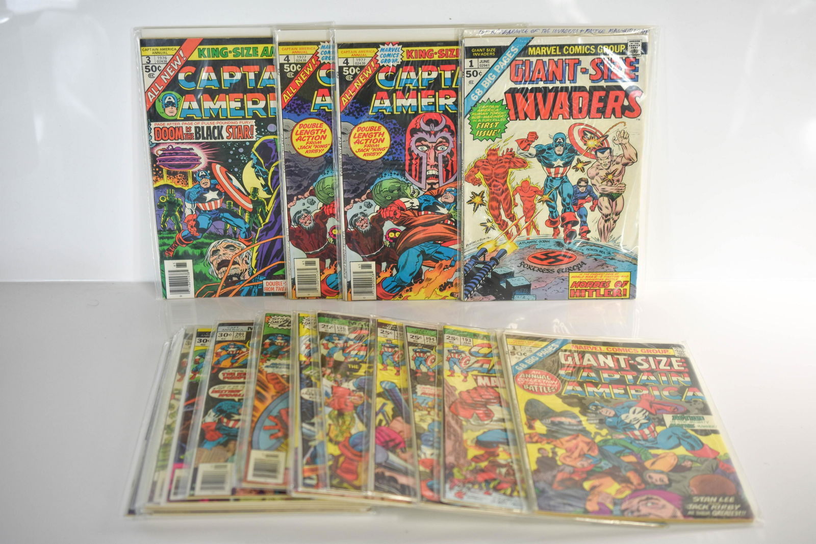Captain America Bronze & Copper Age Comic Grouping: Grouping includes (20) Captain America bronze age, copper age, and more assorted comics including (5) King or Giant Size comics, Kirby cover art begins; Magneto and Hitler flag appearances; origin of