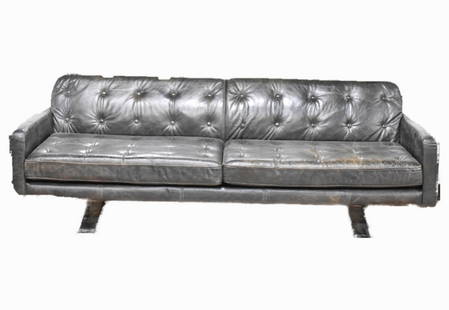 Mid Century Modern Style Leather Sofa: Mid century modern style sofa with stainless steel legs. Very well made, oversized. Provenance: A doctor's private collection, purchased in NY City. Size: 84.5" long x 29.5" high x 34" deep.