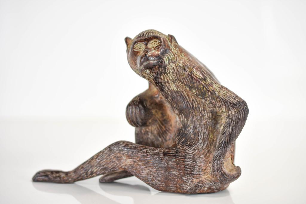 Antique Oriental Polychromed Iron Monkey: A beautiful antique iron monkey figure. There does not appear to be any noticeable makers marks. Provenance: Private collection, Ambler, PA From an estate, collected Chinese artifacts Measures approx.