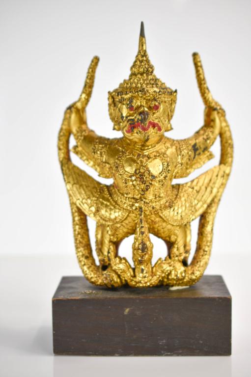 18th/19th Century Gilt Iron Garuda: An 18th/19th century gilt iron garuda statue (also galon or nan belu in Burmese and karura in Japanese). A garuda is a legendary bird or bird-like creature in Buddhist, Jain, and Hindu faiths. Garuda 