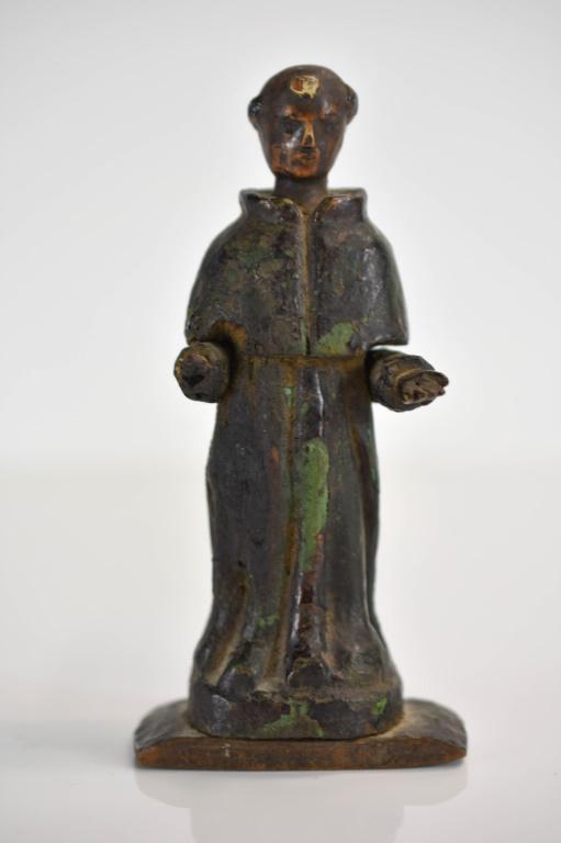 19th Century Carved and Painted Santos: Includes what is believed to be a 19th century carved and painted wooden friar. Has paint loss and the right hand is missing. Measures approx. 5.5"h by 2"w by 1.25"l Provenance: Estate of a private co
