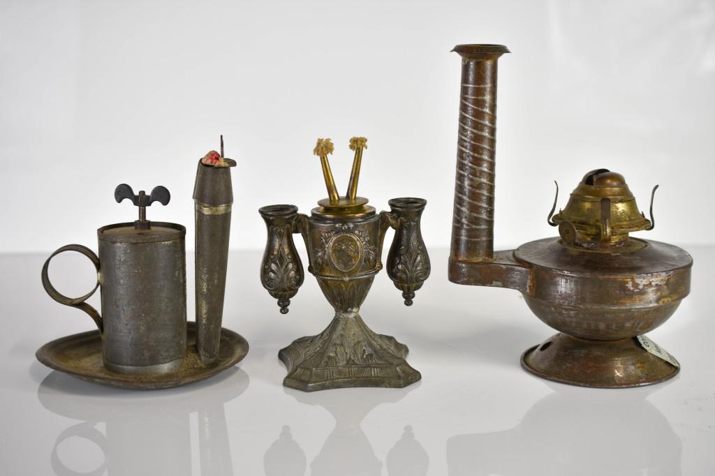 Antique Grouping of Candle / Oil Lamps: Grouping of (3) Antique Candle / Oil Lamps. Includes (1) Combination Kerosene / Oil Sheet Iron Lamp marked "Patented Dec. 17 89 " Measuring approx. 9" H, (1) Primitive Whale Oil Lamp with Faint Markin