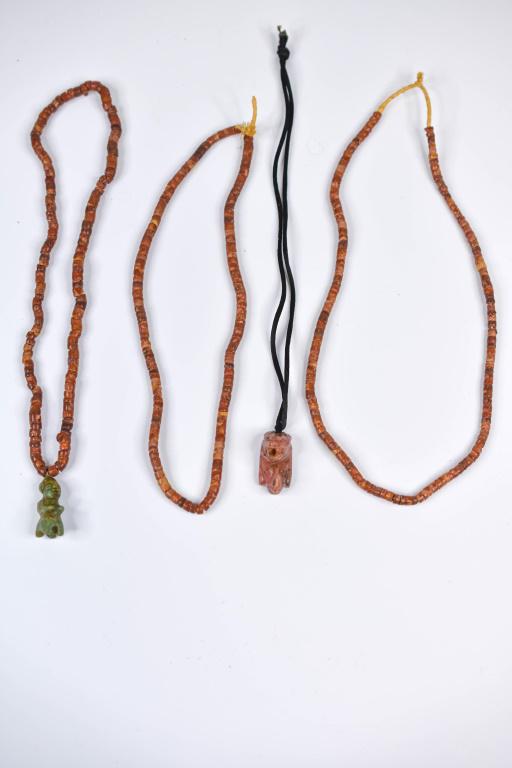 Red Jasper Beaded & Figural Necklaces Lot of 4: Includes: 3 jasper stone disc heishi bead necklaces. 1 with green carved figure of a deity. 1 string necklace with a rose quartz Aztec, Inca carved figure of a wolfs head on top of an Aztec Incan man'